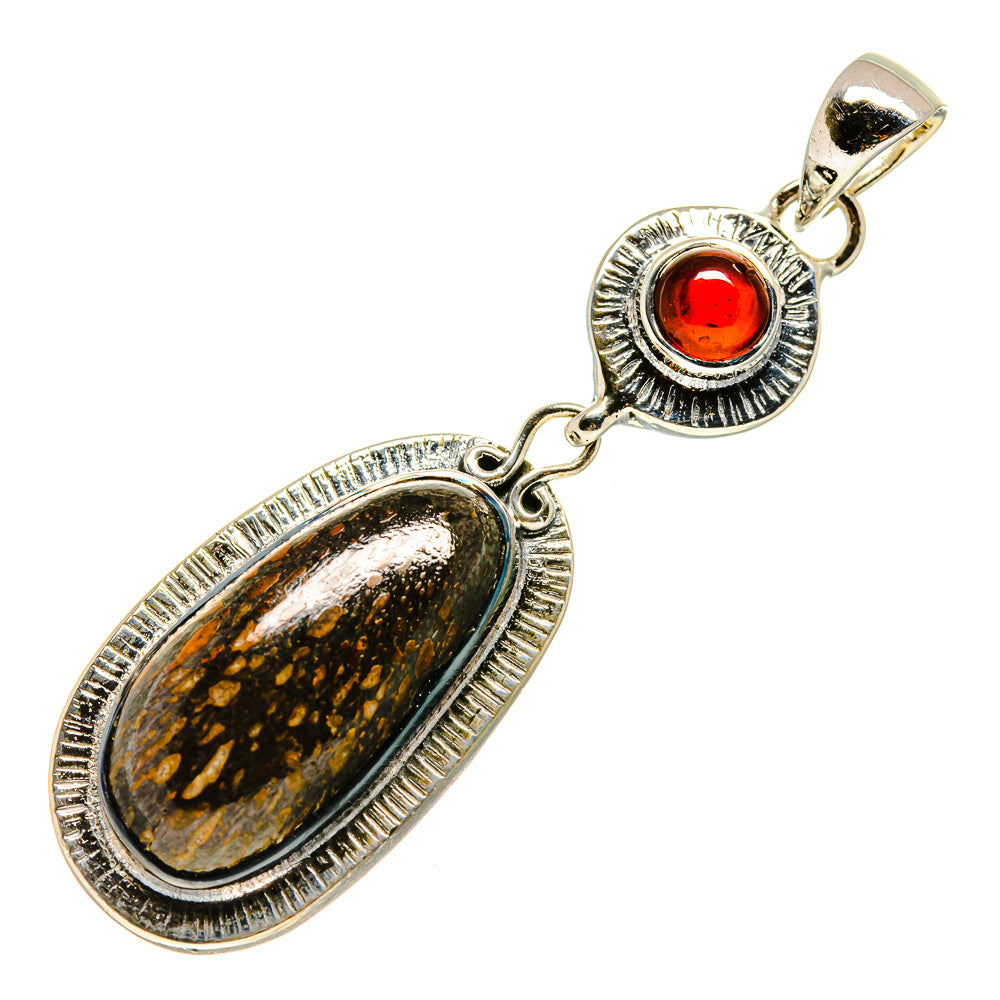 Sterling silver pendant with oval fossil-style stone, red garnet cabochon, bail loop