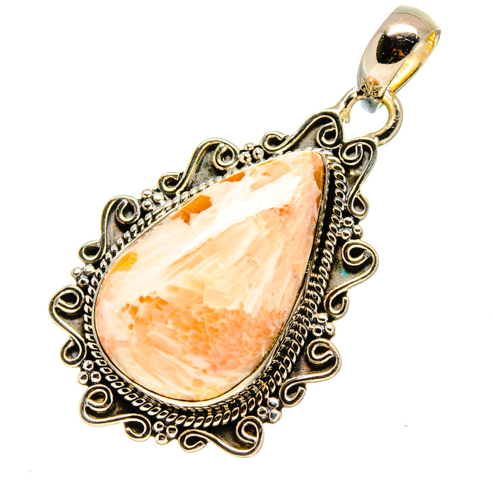 Teardrop scolecite gemstone pendant with ornate silver filigree and round bail