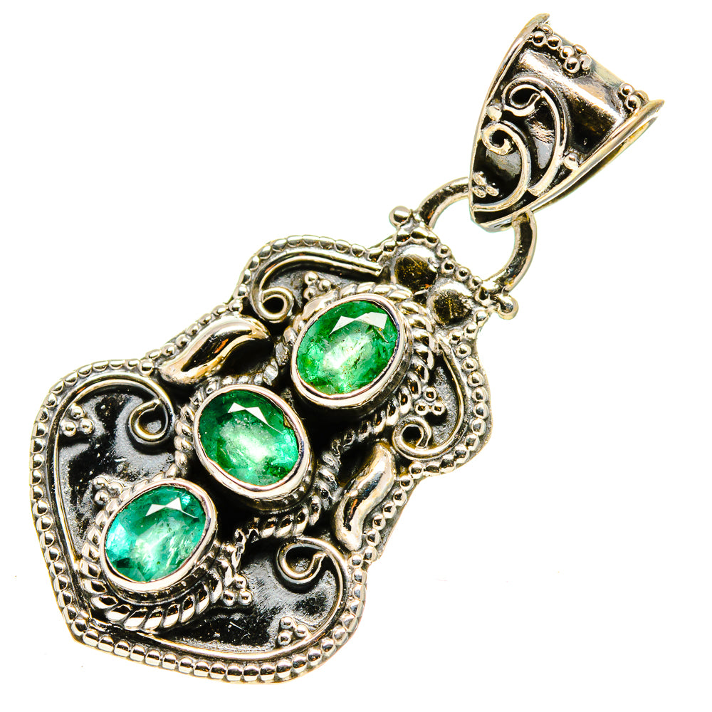 Heart-shaped emerald pendant in ornate 925 sterling silver with three green stones