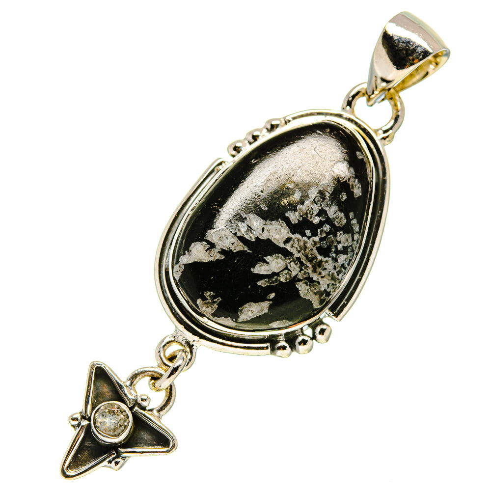 Oval sterling silver pendant with black and white speckled stone and star charm bail