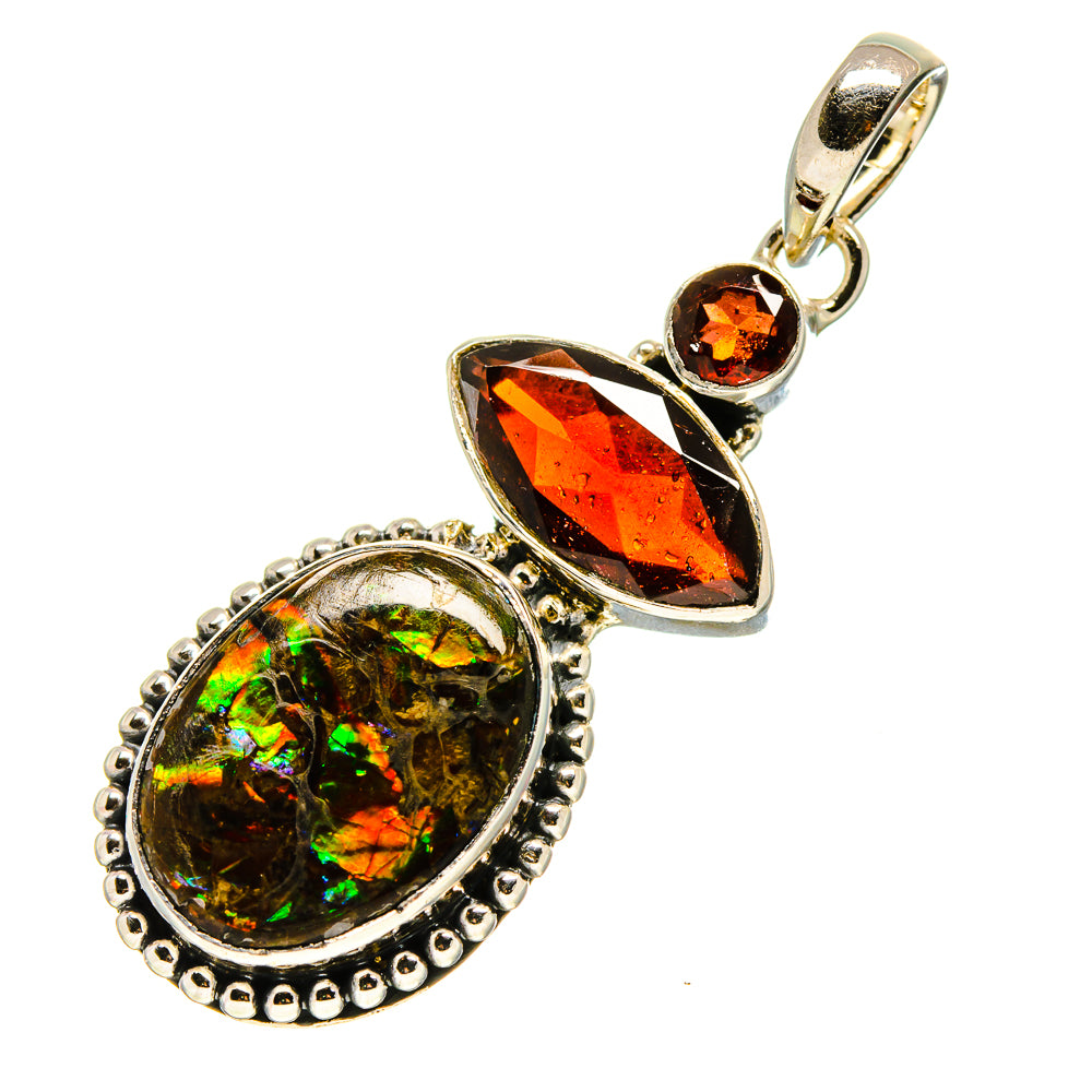 Sterling silver gemstone pendant with iridescent ammolite disc and orange-red garnet accents
