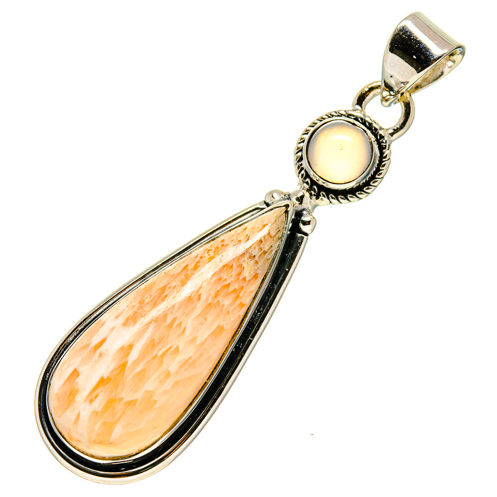 Sterling silver pendant with round pink stone and teardrop peach crystal drop