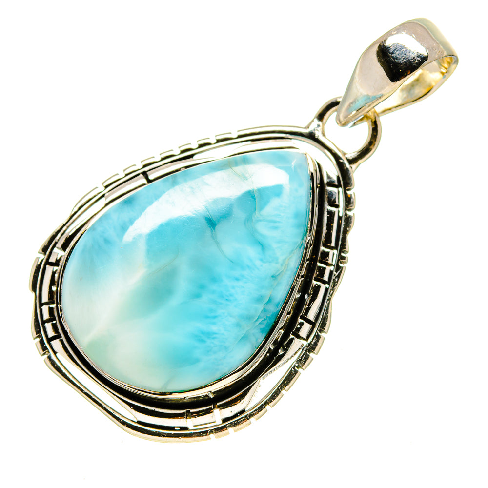 Larimar teardrop pendant with light blue stone, decorative silver edging, top bail