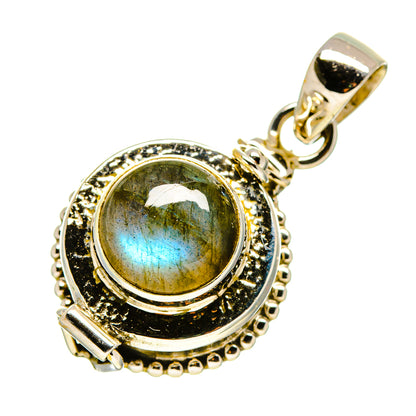 Round labradorite cabochon poison-style pendant in sterling silver with textured frame