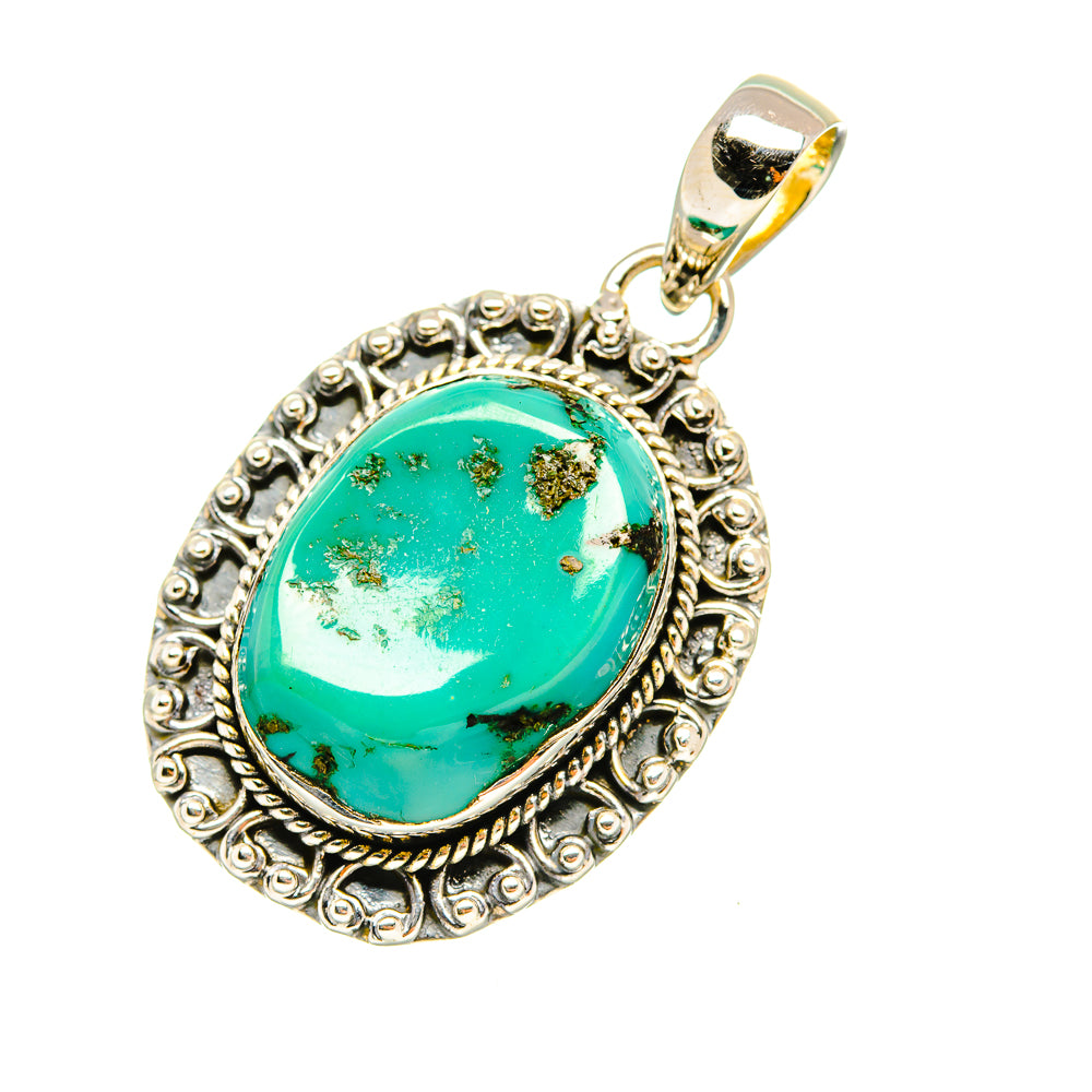 Turquoise pendant, oval cabochon with ornate sterling silver border