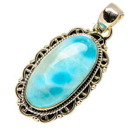 Oval Larimar pendant with turquoise stone in ornate sterling silver bezel setting
