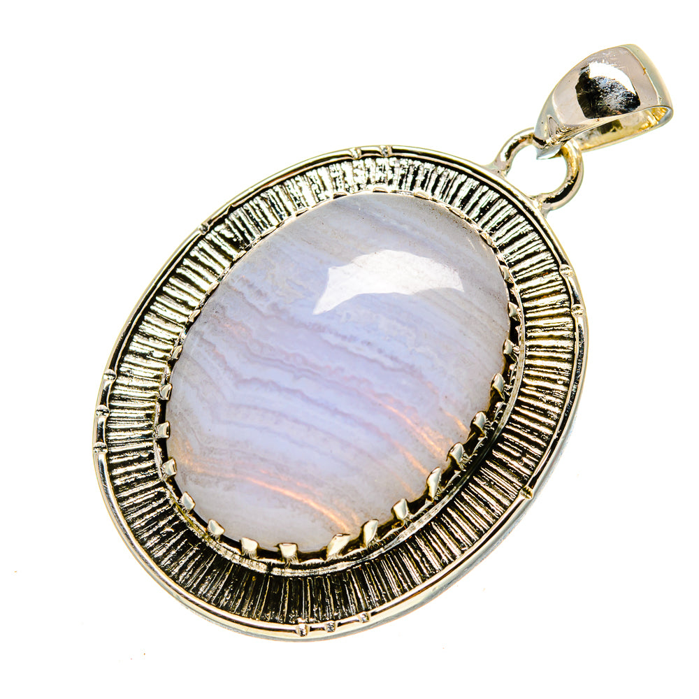 Sterling silver pendant with oval blue lace agate cabochon and ridged bezel, top bail