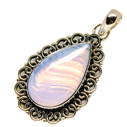 Teardrop blue lace agate pendant with ornate sterling silver frame and top bail