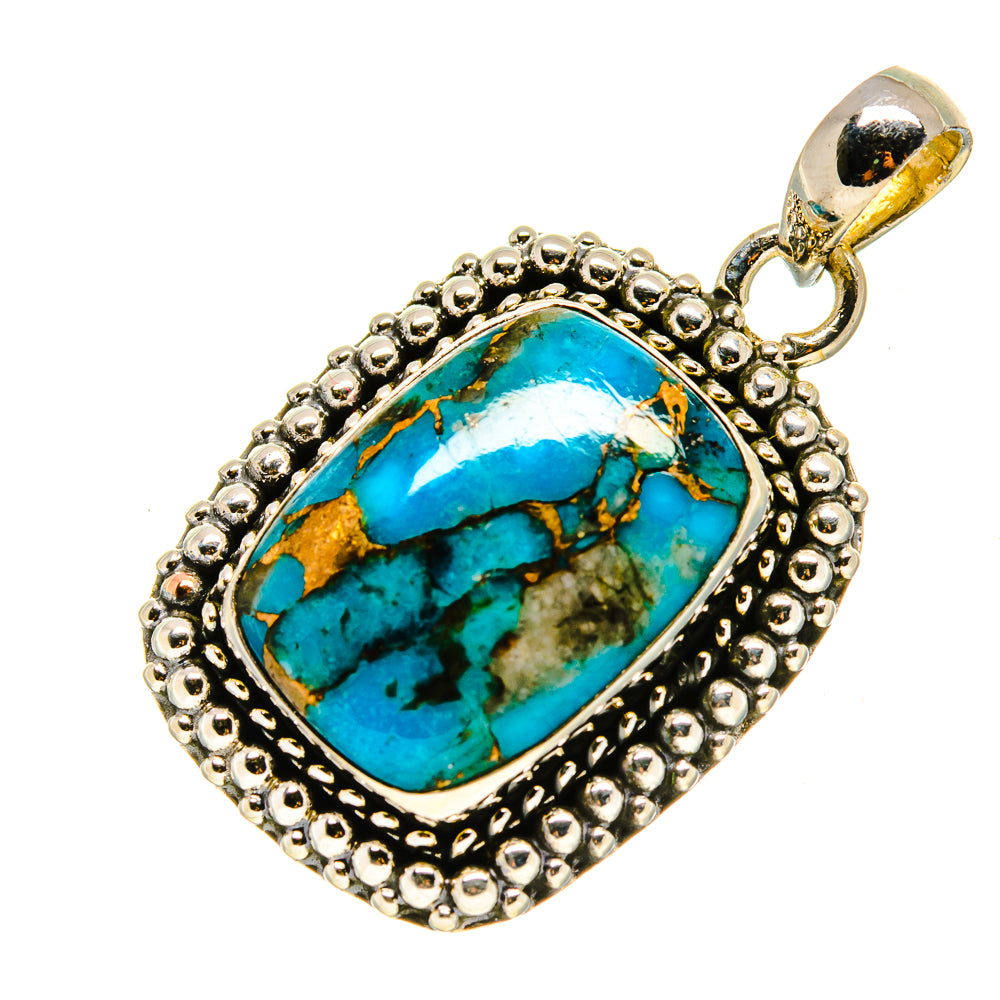 Oval turquoise cabochon pendant in textured silver frame with loop bail