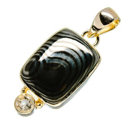 Rectangular psilomelane pendant with silver border, gold bail, and two gemstone drops