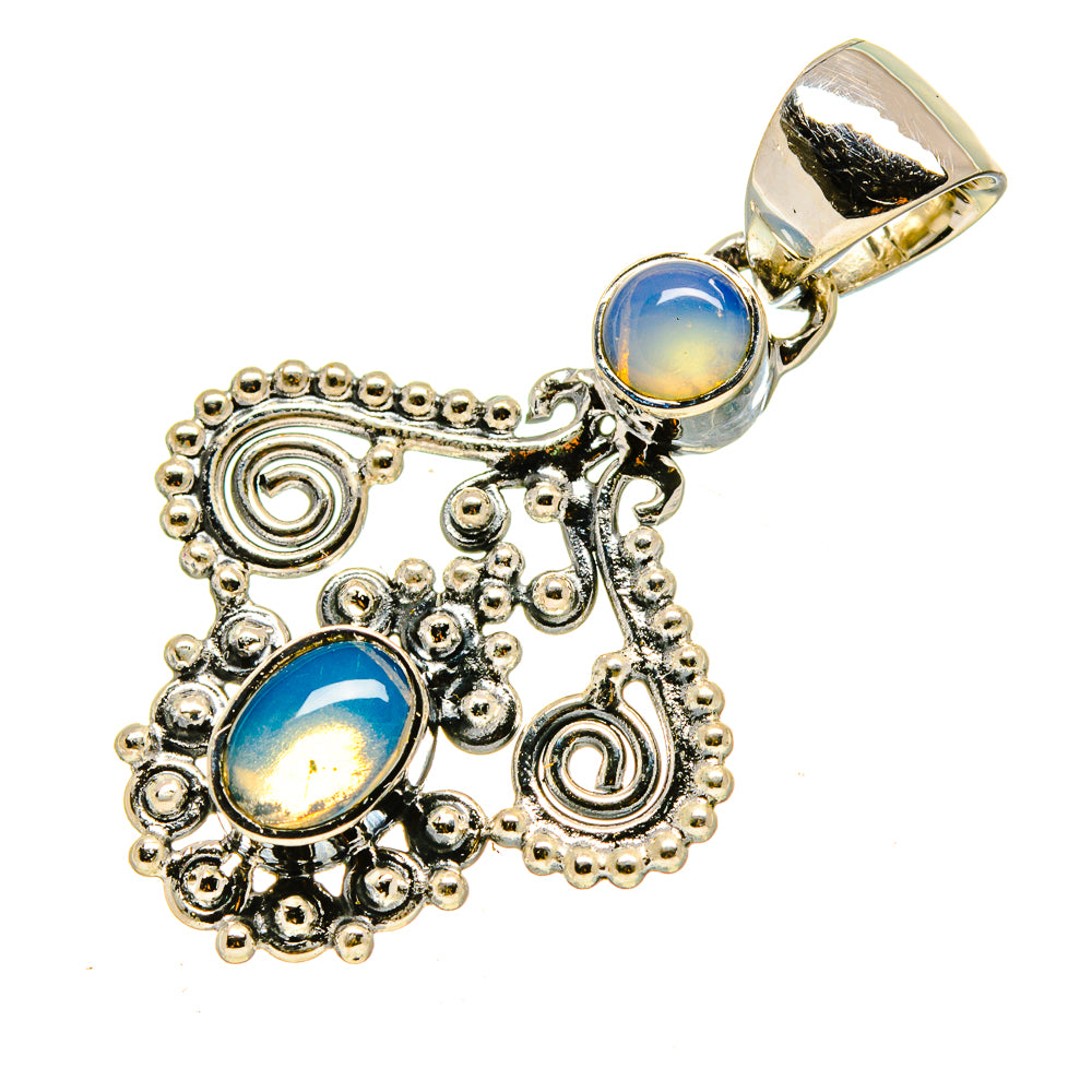Sterling silver pendant with Ethiopian opal cabochons, two oval blue stones in ornate frame