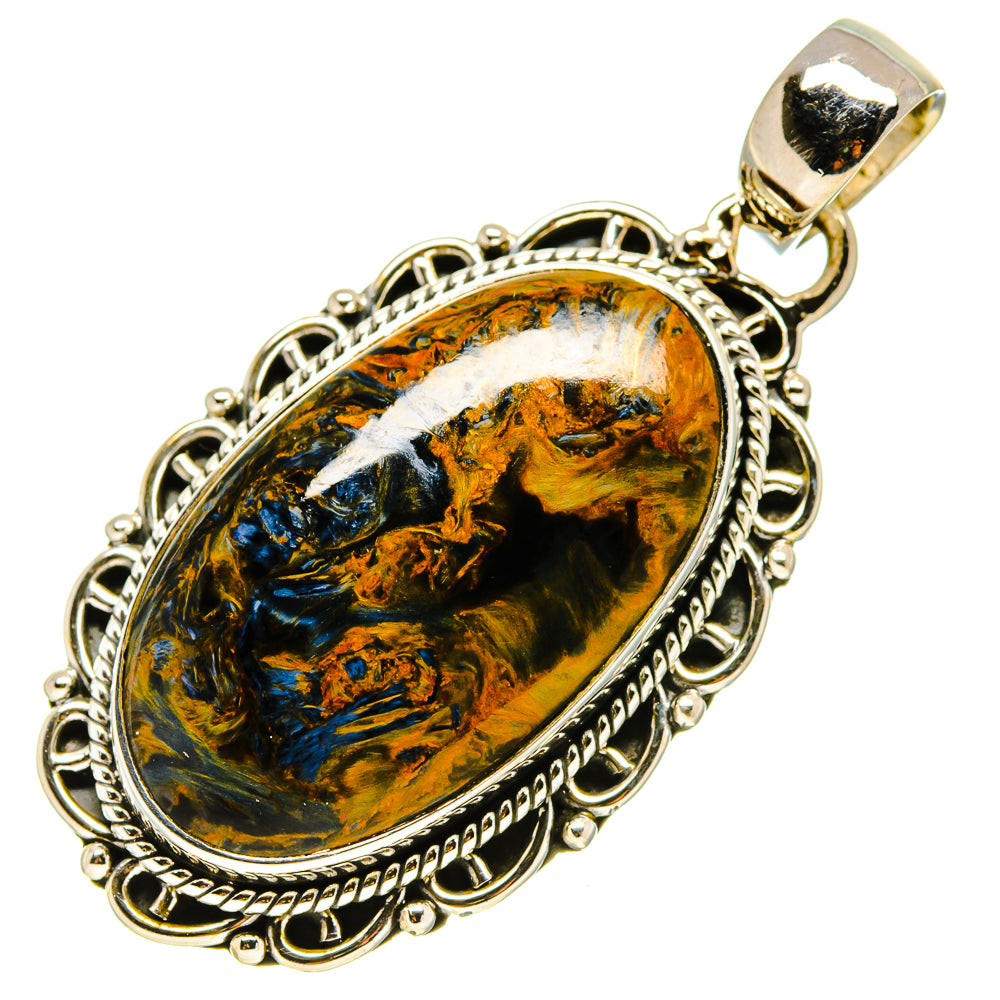 Oval pietersite pendant in silver-tone bezel with ornate rope edge and loop bail