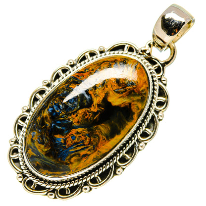 Oval pietersite pendant in silver-tone bezel with ornate rope edge and loop bail