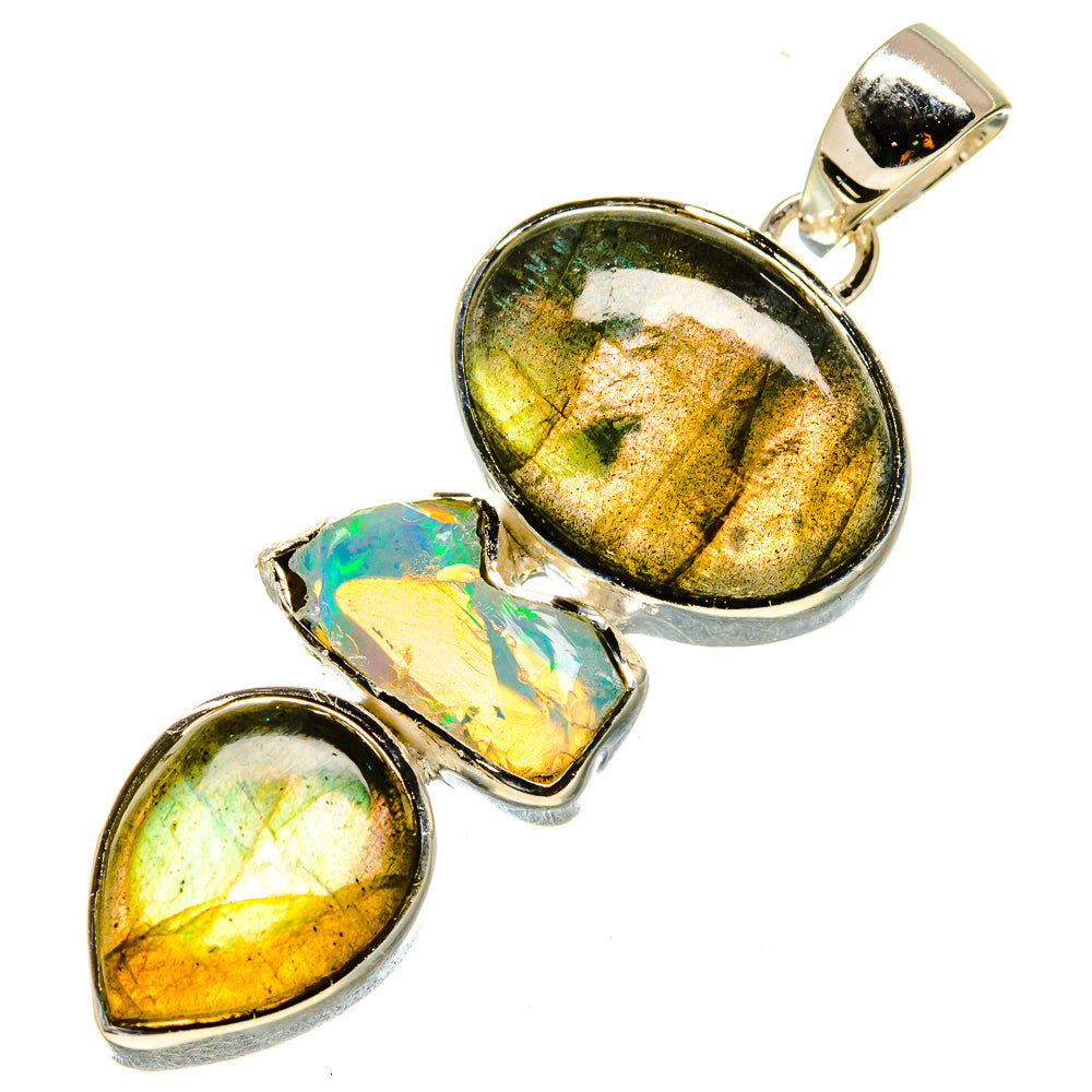 Sterling silver pendant with oval labradorite and rough Ethiopian opal pieces in bezels