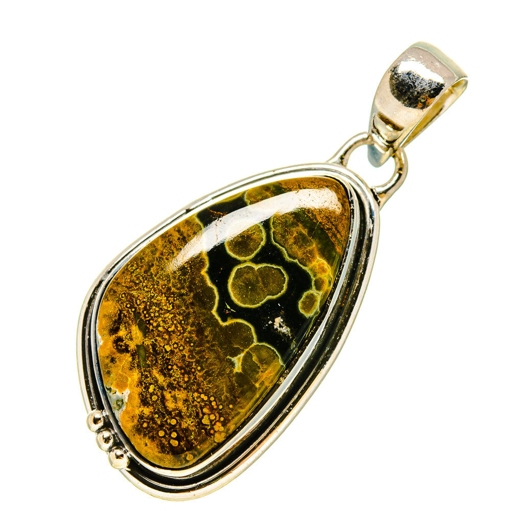 Ocean jasper pendant with oval stone set in gold-tone and silver bezel, hanging bail