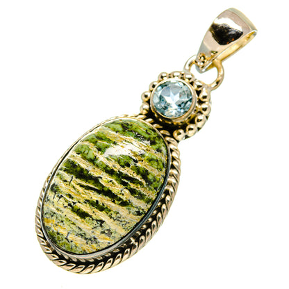 Sterling silver lizard jasper pendant with blue topaz round bezel and ornate border