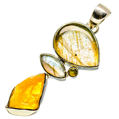 Sterling silver pendant with three opal cabochons: round yellow, oval pale blue, teardrop