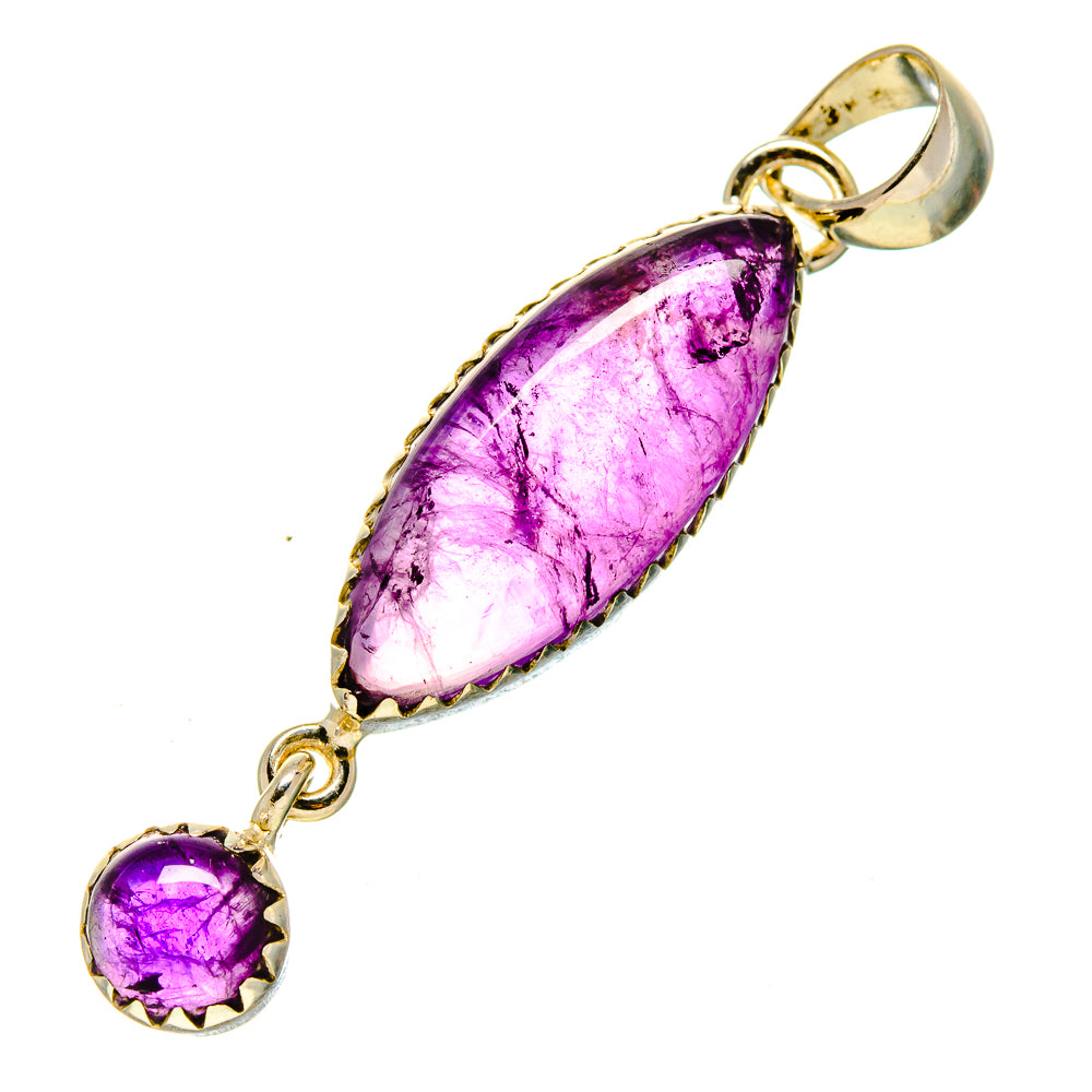 Amethyst pendant in sterling silver with purple teardrop center stone and round end stone