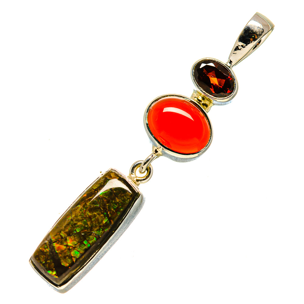 Sterling silver pendant with iridescent rectangular green stone, red oval cabochon, top view