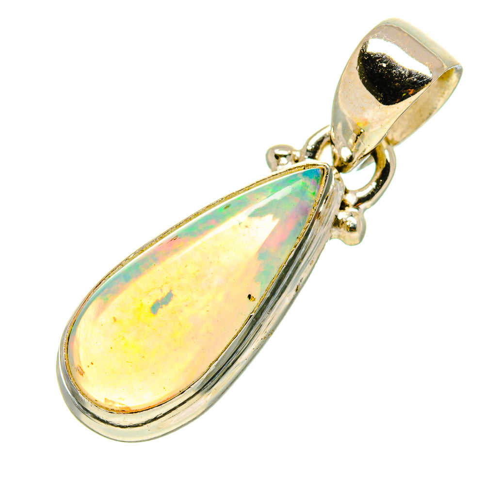 Natural Ethiopian opal pendant with teardrop opal and sterling silver bail, isolated