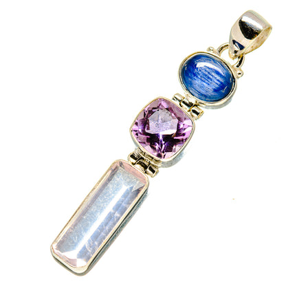 Gemstone pendant with blue oval cabochon, purple cushion-cut stone, and clear elongated crystal