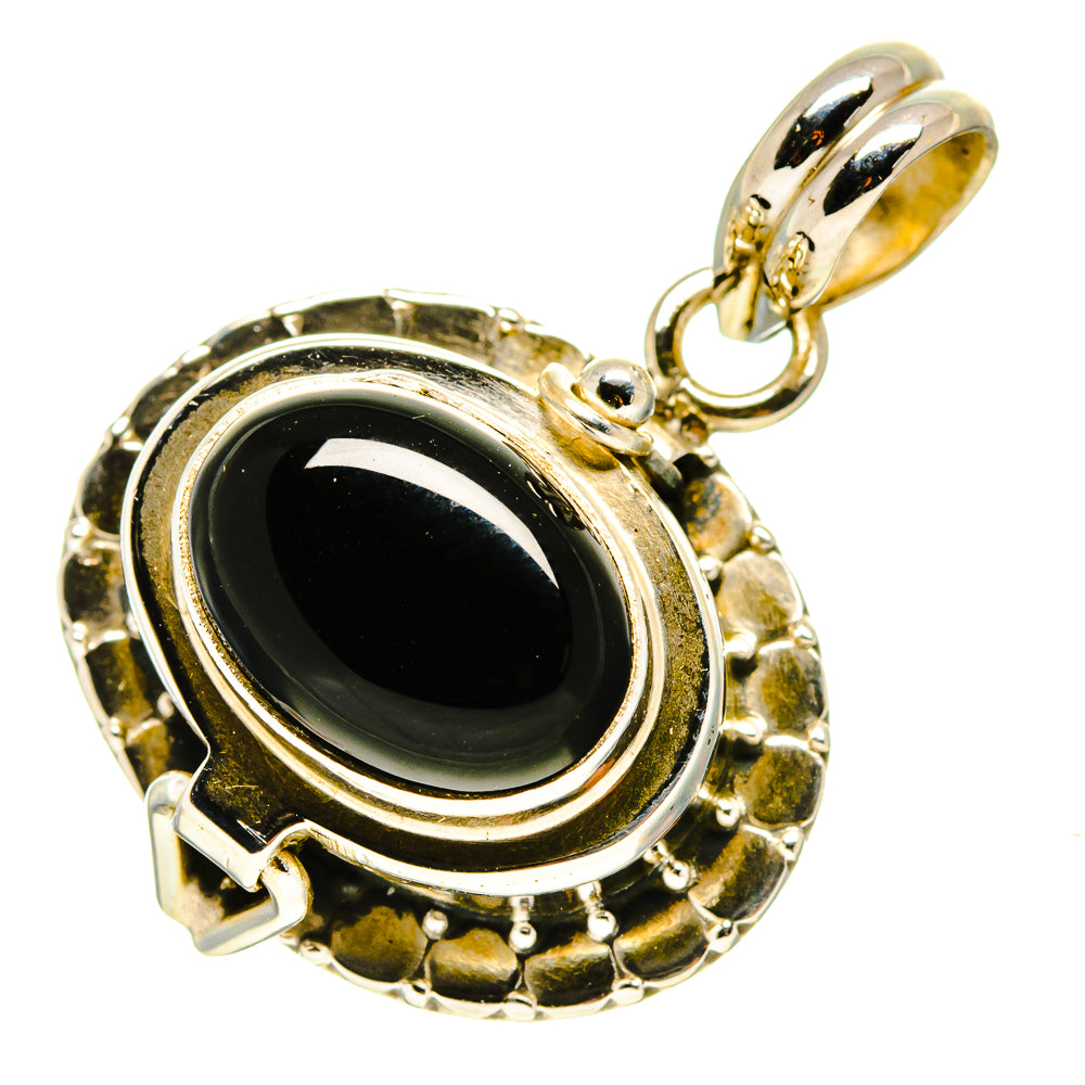 Black onyx poison pendant with oval black stone in round gold-tone bezel
