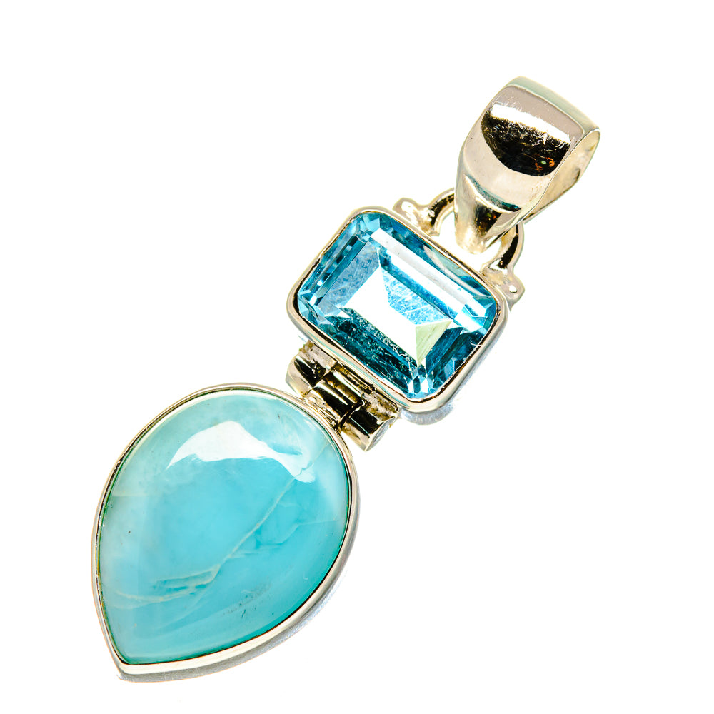 Sterling silver pendant with oval larimar and rectangular blue topaz in bezel setting