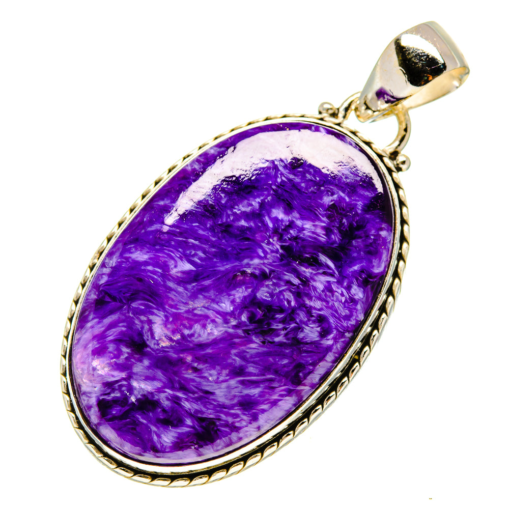 Purple charoite pendant with oval stone in ornate sterling silver bezel
