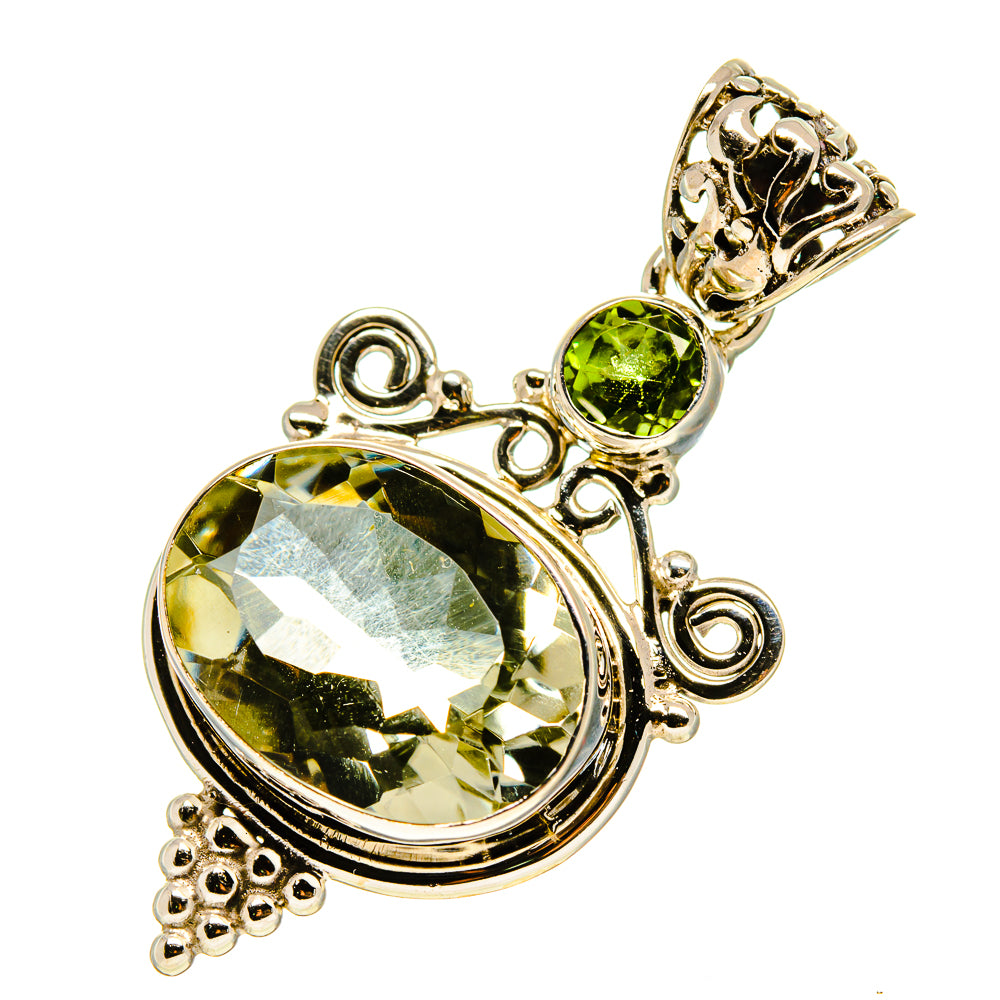 Sterling silver pendant with large faceted green stone and round peridot accents