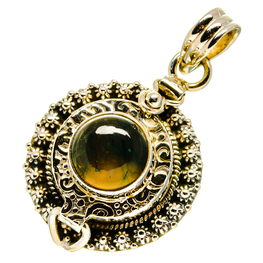 Moss agate pendant with round green cabochon, detailed silver border, and hanging loop