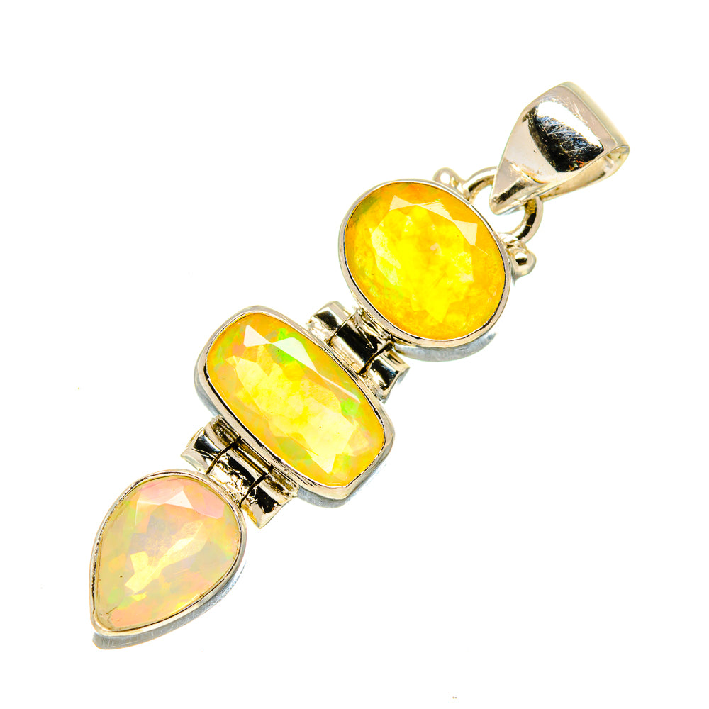 Faceted opal pendant in sterling silver, three yellow opal stones with metal bezels.