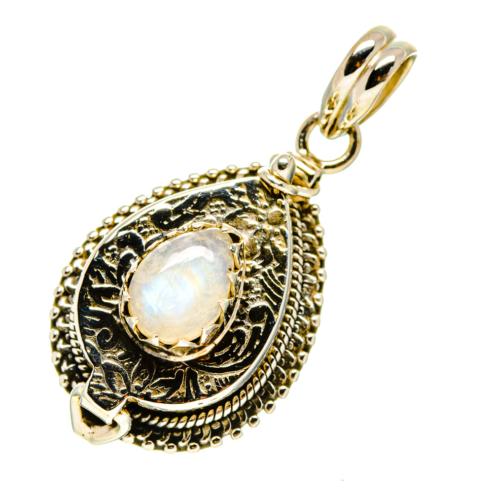 Gold-tone moonstone pendant with oval opalescent stone, ornate bezel and hanging bail