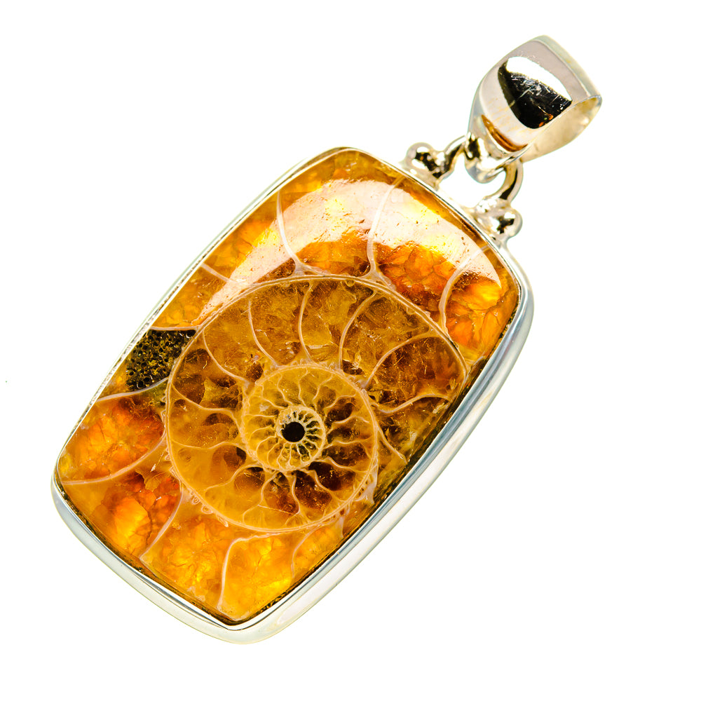 Rectangular ammonite fossil pendant with orange-gold spiral pattern in silver frame