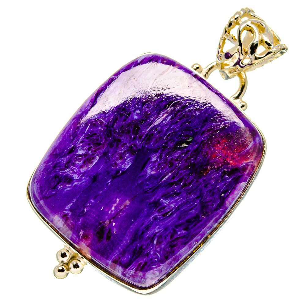 Square purple charoite pendant with silver-toned bezel and decorative bail, on chain loop