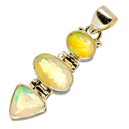Sterling silver opal pendant with three faceted stones, gold-toned bail at top
