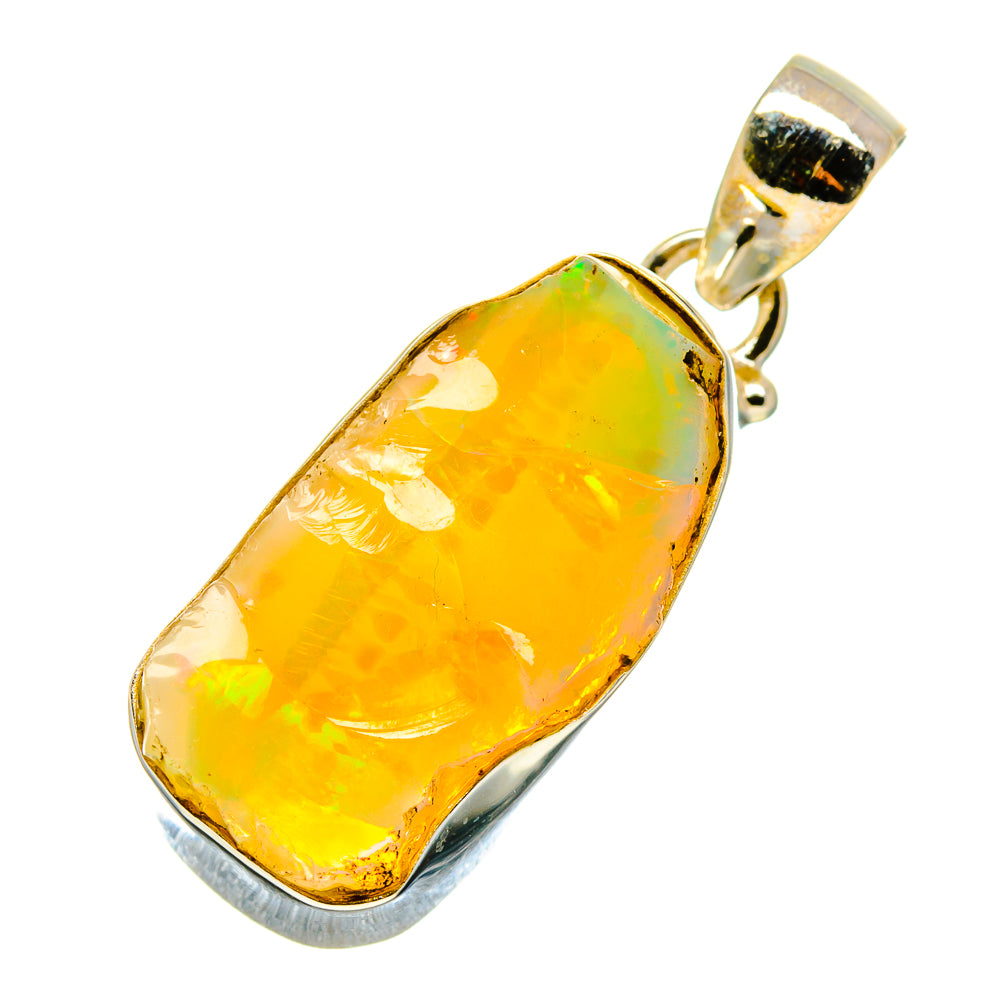 Sterling silver opal pendant with rough oval yellow-orange gemstone and bail