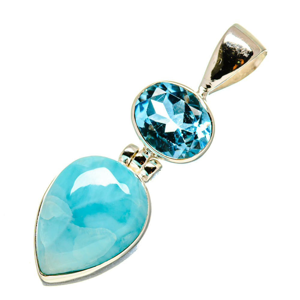 Sterling silver pendant featuring oval blue stone and round faceted blue gemstone