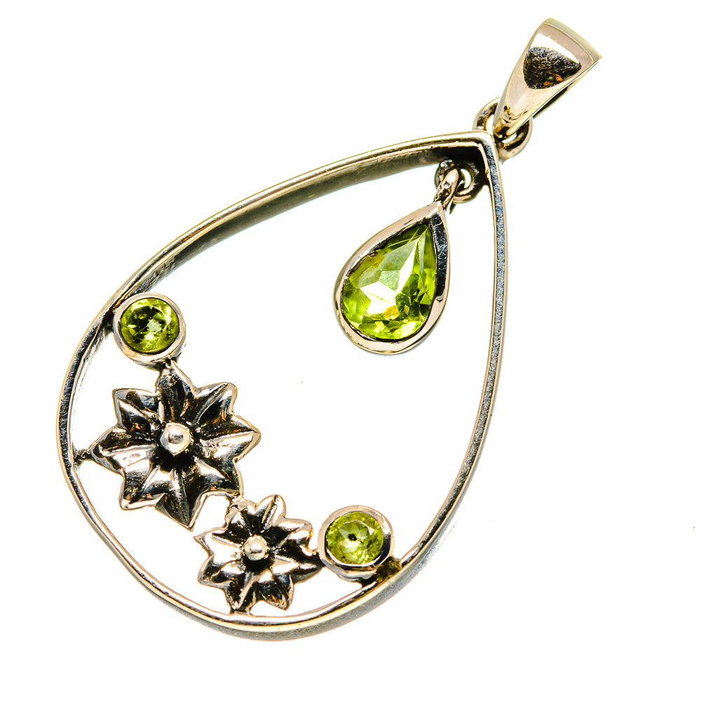 Sterling silver teardrop pendant with green peridot stones and four flower accents