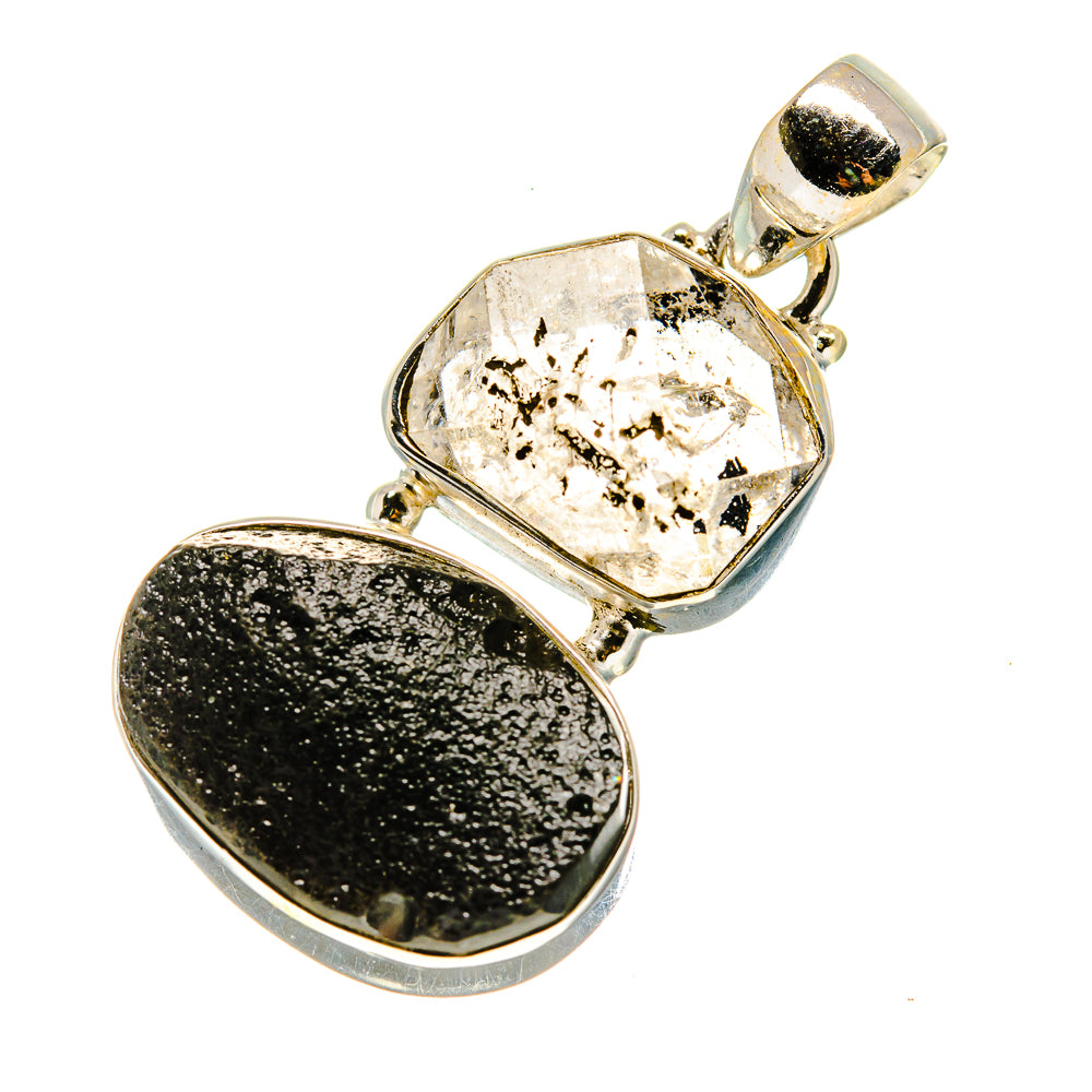Sterling silver tektite and clear crystal pendant, oval black stone with textured surface