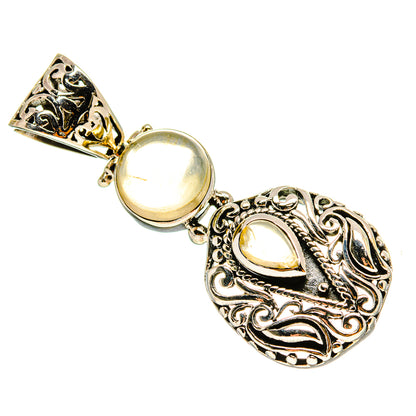 Sterling silver rose quartz pendant with two round light stones and decorative filigree