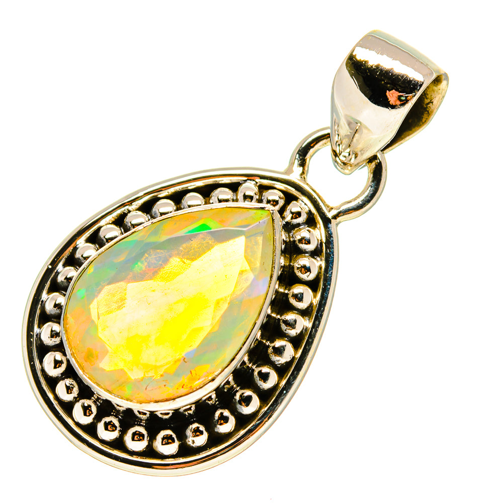 Opal teardrop pendant with gold-tone halo bezel and top loop bail