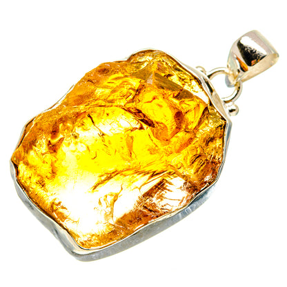 Rough citrine pendant with amber-yellow stone in 925 silver bezel and loop bail