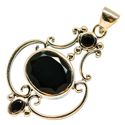 Black onyx pendant in 925 sterling silver with round black stone and ornate swirl