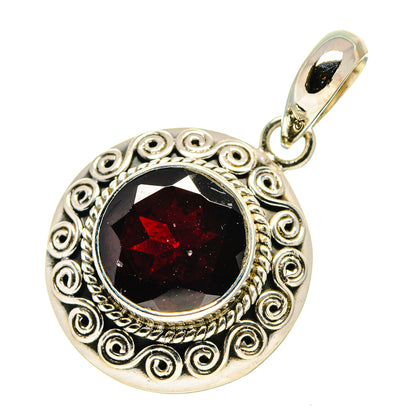Round garnet pendant in 925 sterling silver with ornate bezel and top loop