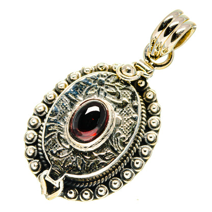 Garnet red poison pendant in ornate sterling silver with loop bail and etched halo