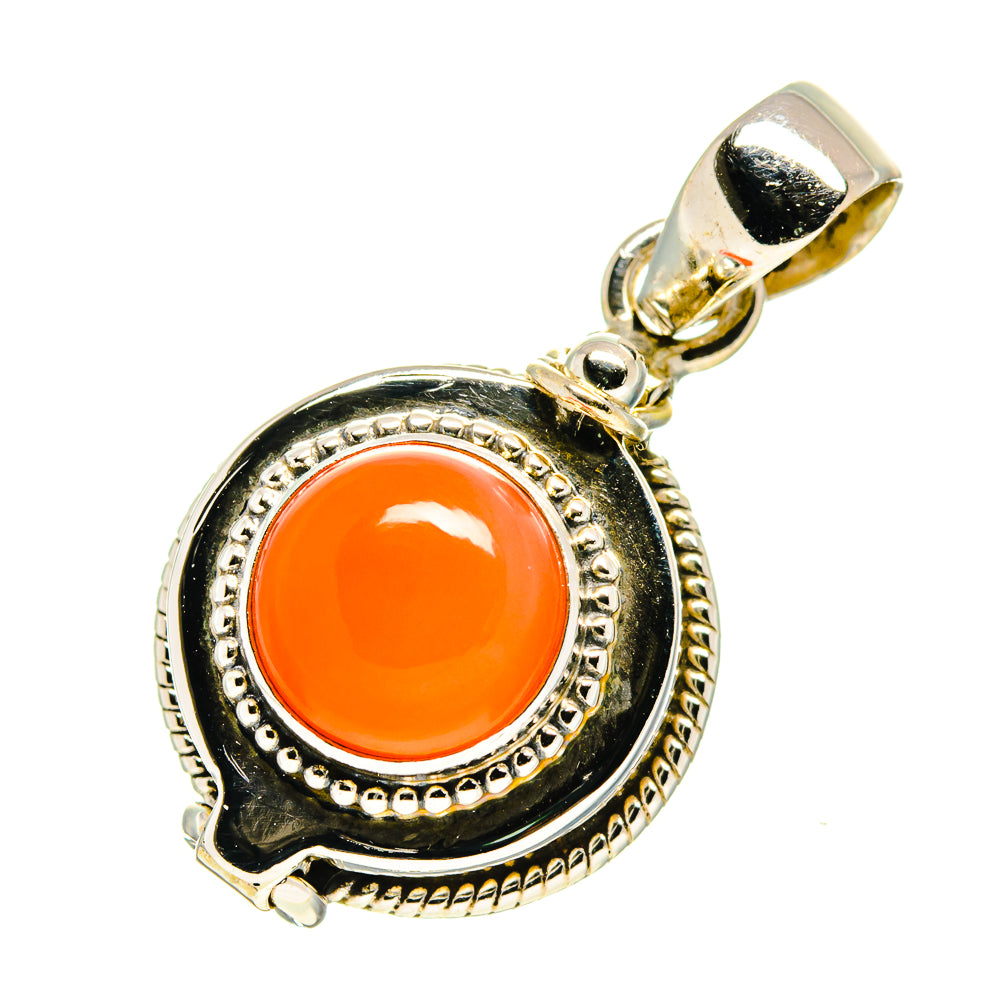 Poison pendant with orange carnelian cabochon, bail and textured 925 sterling silver frame