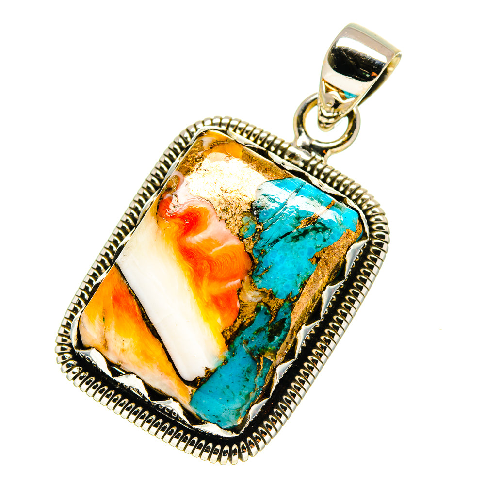 Turquoise and orange stone pendant with ornate silver bezel and bail