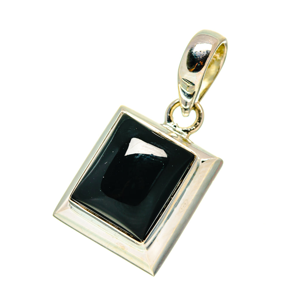 Black onyx square pendant in silver bezel with top loop bail