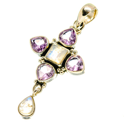 Amethyst pendant with purple gemstones, iridescent moonstone teardrop, and silver setting