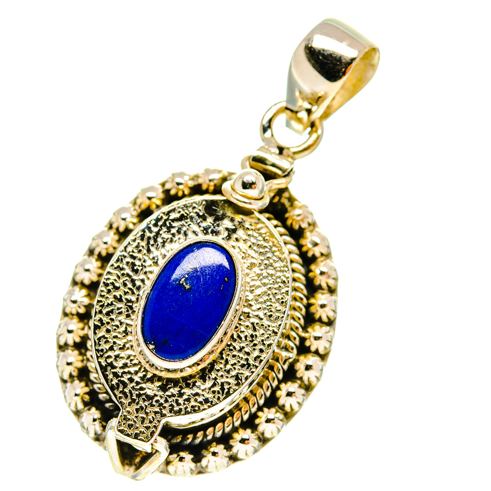 Lapis lazuli poison pendant with oval blue stone set in textured 925 sterling silver frame.
